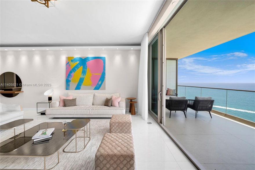 Welcome to this impeccably designed residence at Armani Casa. This exquisite condo features three bedrooms, a fully functioning den with a bathroom and closet, and maid quarters with a bathroom and closet. Enjoy breathtaking ocean and Intracoastal views from the two oversized terraces, complete with a convenient summer kitchen. Every detail has been thoughtfully upgraded, including custom Italian closets, wallpaper, electric blinds, and light fixtures. Armani Casa offers a wealth of luxurious amenities, including a restaurant, coffee bar, swimming pool, beach service, expansive fitness center, spa, beauty salon, kids playground, and a cigar lounge. Indulge in the epitome of elegance and sophistication at this remarkable residence.