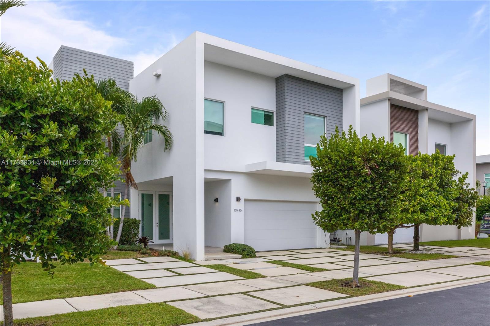THIS SPECTACULAR HOME LOCATED IN THE MOST PRESTIGIOUS AND EXCLUSIVE GATED COMMUNITY, THE MANSIONS AT DORAL, WITH ONLY 66 RESIDENCES OF ULTRA LUXURY. MODEL NAME MANSION V. PREMIUM FINISHES, ITALIAN GOURMET KITCHEN BY VENETA CUCINE, LUXURY SUB-ZERO WOLF APPLIANCES PACKAGE , AUTOMATIC CABINETRY, STAINLESS STEEL SINKS, SUPREMELY SMART SYSTEM , ELEGANT PORCELAIN BATHROOM TILES,CONTEMPORARY BATHROOM FIXTURES, IPADS, CAMERAS, AUDIO ZONES, A/C CONTROL AND ALARM. DURAVIT SMART TOILET IN MASTER ROOM, HIGH IMPACT WINDOWS, TESLA EV CHARGER 50 AMP EV GARAGE PLUG. 24/7 SECURITY PATROL. Please allow 24 hours for showing arrangements. Thank you!