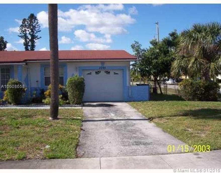 Lovely single family home on a corner lot of land.This home features tiles throughout and a garage.The florida Room is enclosed also with air conditioner.Kitchen has a lot of room with double sinks and double door .The driveway can hold a few cars and there is the garage also. The commission paid will be determined by the Bank and could be less than 3.0% to the selling Broke
