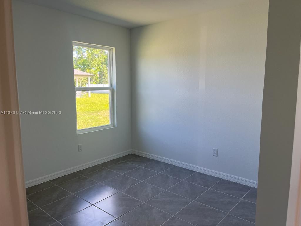 Photo of 270 SW Tulip Blvd #1, Port Saint Lucie, FL 34953 (MLS # A11376127)