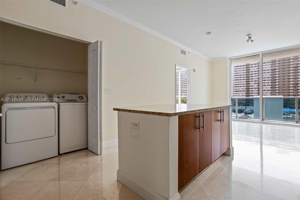 Photo of 1945 S Ocean Dr #503, Hallandale Beach, FL 33009 (MLS # A12012131)