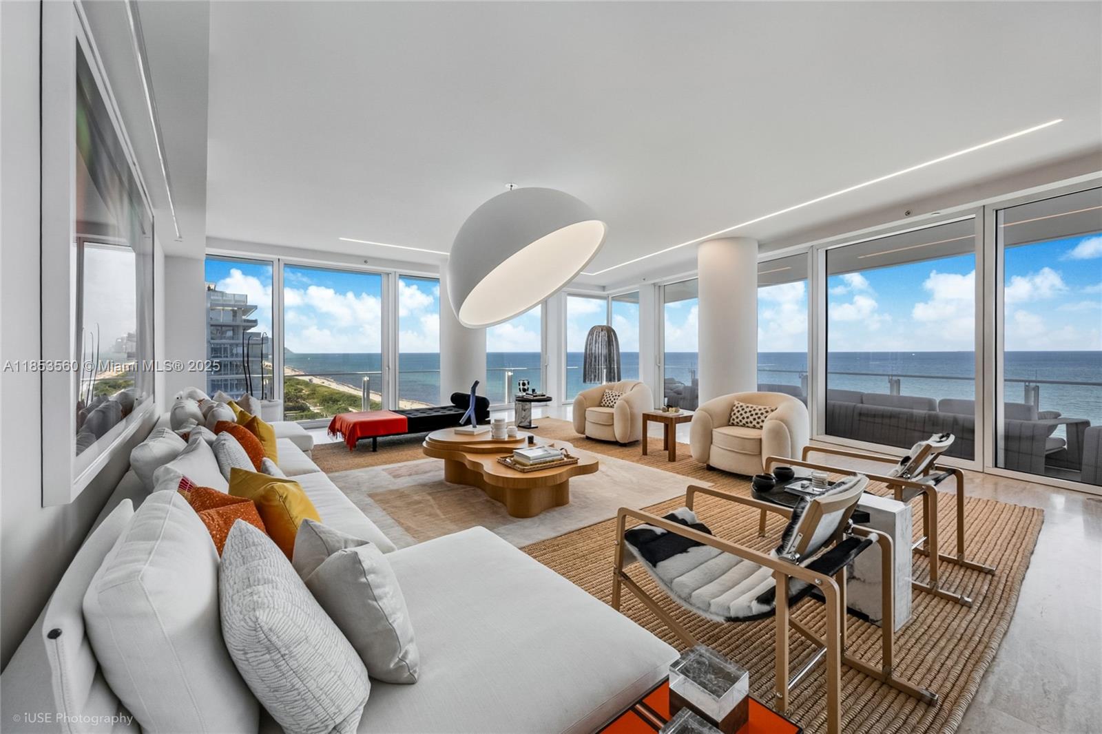 Experience the LEGENDARY FOUR SEASONS LIFESTYLE in one of the LARGEST FLOORPLANS at The Surf Club. This 7-BEDROOM, 7,387 SF residence—masterfully designed by Delphine Krakoff and featured in Elle Décor, offers BREATHTAKING OCEAN VIEWS, sunrise-to-sunset exposure, and an expansive wraparound terrace. Thoughtfully appointed for elegant living and entertaining, it includes a CHEF'S KITCHEN, CUSTOM LIBRARY, GAME & MEDIA ROOMS, and a WEST-FACING FAMILY LOUNGE to capture iconic MIAMI SUNSETS. Enjoy the ART OF HOSPITALITY by Four Seasons with à -la-carte services including 24-hr concierge, in-room dining, housekeeping, & more. Property: 4 Pools & Beach (fully serviced), Residents-Only Fitness Centers, 4 Restaurants including Thomas Keller restaurant, Four Seasons Spa, 2 shops, & more.
