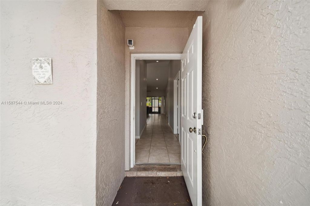 Photo of 4949 E Lakes Dr, Deerfield Beach, FL 33064 (MLS # A11587544)