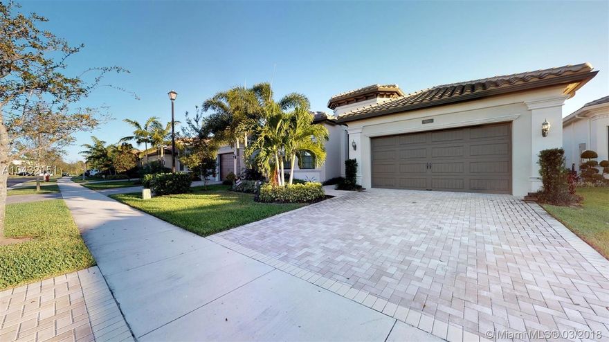 AMAZING FULLY FURNISHED DECORATED BY ARTEFACTO, READY TO DELIVER A SPECTACULAR TURNKEY LAKE FRONT HOME W/ CUSTOM IN-GROUND POOL & 2 CAR GARAGE, IN THE 7 BRIDGES GATED COMMUNITY ! RESORT  LIVING W/OUT COUNTRY CLUB FEES. 4BRS + MOVIE THEATER RM, FORMAL DINING & LIVING, FULL WET BAR. CERAMIC FLRS THROUGHOUT MAIN LIVING AREA & WOOD FLRS IN BEDROOMS, EUROPEAN UPGRADED KITCHEN CABINETS, STAINLESS STEEL APPLIANCES & QUARTZ COUNTERTOPS, MB HAS CUSTOM CLOSETS. ALL BATHS HAVE UPGRADED CABINETS. THIS HOME HAS IMPACT/HURRICANE PROOF GLASS WINDOWS AND DOORS. PATIO HAS A GAS SUMMER KITCHEN. NEW 30,000 SQ.FT. STATE OF THE ART CLUBHOUSE CONTAINING 2 GOURMET RESTAURANTS & GYM. WITH 13 OUTDOOR TENNIS COURTS, ON-SIGHT TENNIS PRO, 3 RESORT STYLE COMM.POOLS, BARS INSIDE & OUT, KIDDIE POOL & WATER-SPLASH AREA.