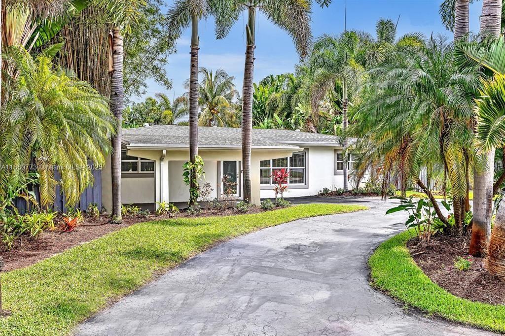 Make this beautiful property your new home in Oakland Park, Florida. Nestled in a quiet and secure neighborhood. The remodeled kitchen features quartz countertops and stainless-steel appliances. Enjoy the serenity of a fully outfitted tropically gated private backyard, complete with an underground pool and a above ground jacuzzi. Meticulously designed to be your next home. Unwind in your spa and heated sparkling pool within a serene resort-like backyard, surrounded by lush landscaping. Just minutes from Fort Lauderdale and to Lauderdale-By-The-Sea's pristine beach. This modern gem boasts ceramic tile floors, hurricane-proof windows, and doors. With a new Diamond Brite pool finish and a 10-year warranty on the newer AC (2023) and roof (2022).