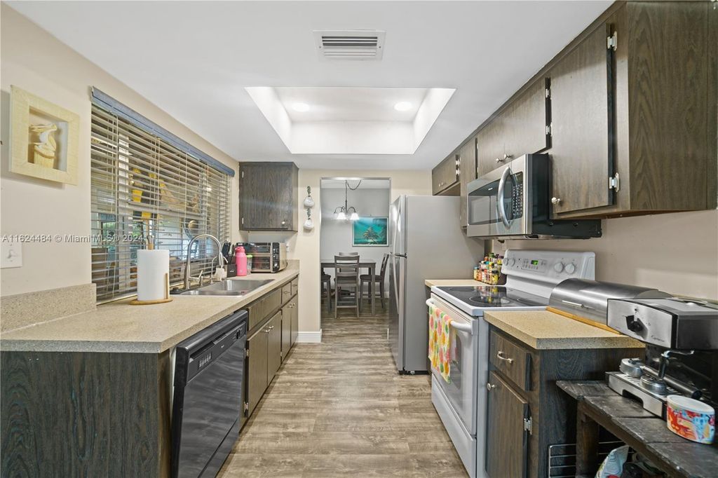 Photo of 6104 NW 71st Ave, Tamarac, FL 33321 (MLS # A11624484)