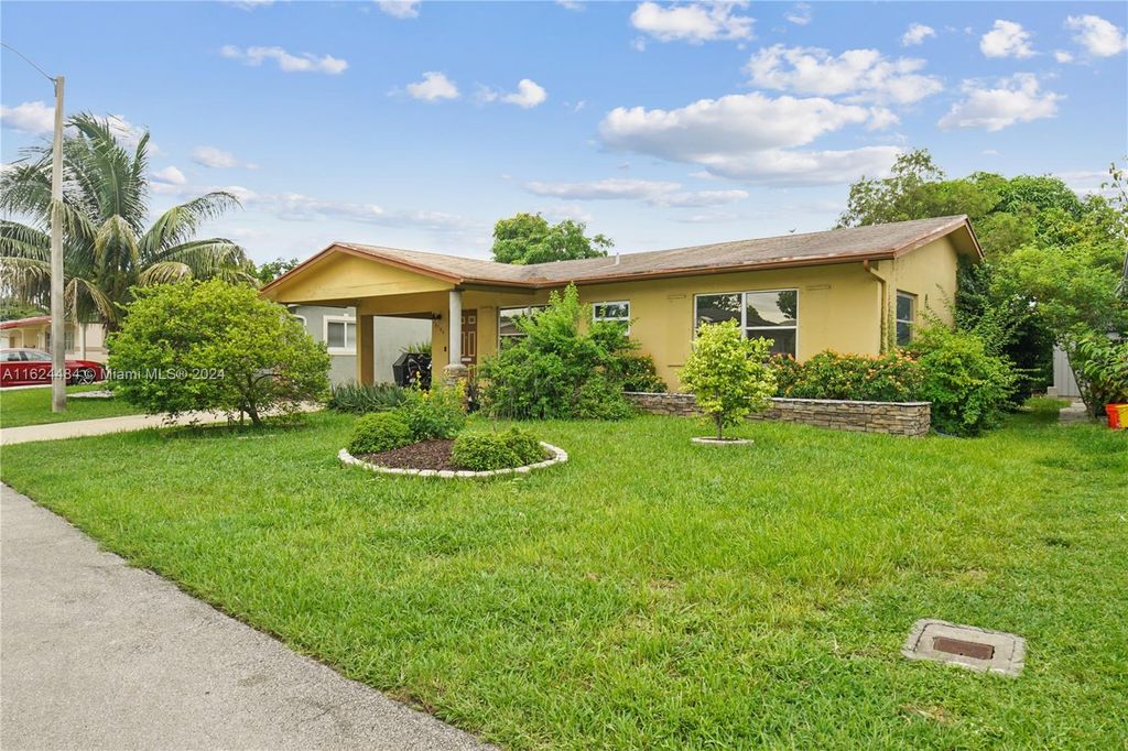 Photo of 6104 NW 71st Ave, Tamarac, FL 33321 (MLS # A11624484)