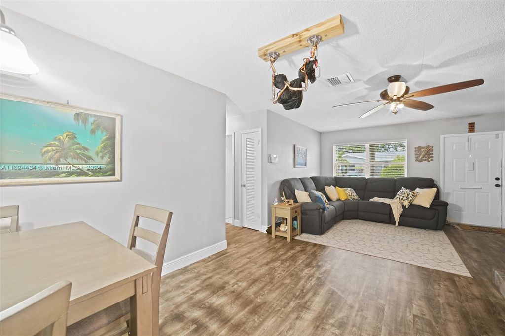 Photo of 6104 NW 71st Ave, Tamarac, FL 33321 (MLS # A11624484)