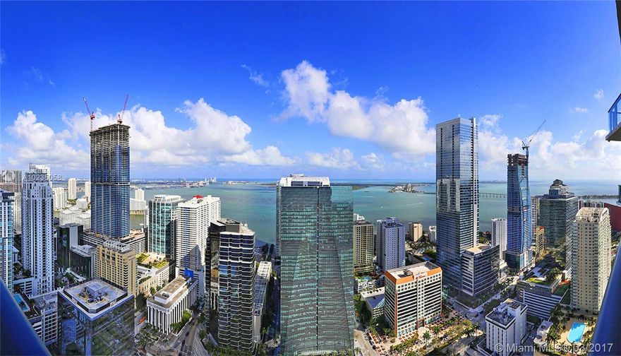 Spectacular 3 bed + Den PH in luxurious SLS Brickell. This condo features clad floor-to-ceiling glass windows and large balcony with panoramic views of the ocean and Miami skyline.  Sleek wood like porcelain tile floors, California closets and electric blinds in every room. Master bath presents spacious soaking tub and frameless glass enclosed shower. World class décor by Philippe Starck and includes unforgettable dining by award-winning chefs. Amenities include incredible pool deck.
