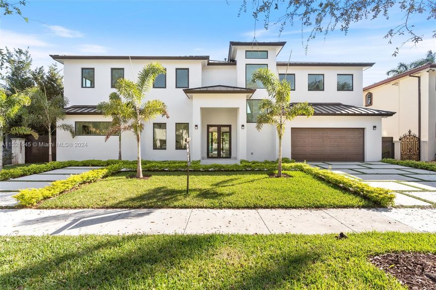 Experience luxury in this 2024 Miami lakes modern estate. This new construction home offers breathtaking views of the water and the finest finishes. From the moment you step inside, you'll be greeted with an open floor plan, high ceilings, and natural lighting. This home offers 5 spacious bedrooms with built-in custom closets and 5 bathrooms. The gourmet kitchen features top-of-the-line appliances and ample counter space, perfect for entertaining. Take in the scenic views from the comfort of your own backyard, complete with a sparkling pool and spa. Amazing floor to ceiling impact doors and windows, a new metal roof and 2 car garage! Don't miss this opportunity to live in the newest built custom home in the highly desirable Royal Oaks Community of Miami Lakes. Schedule a tour today!
