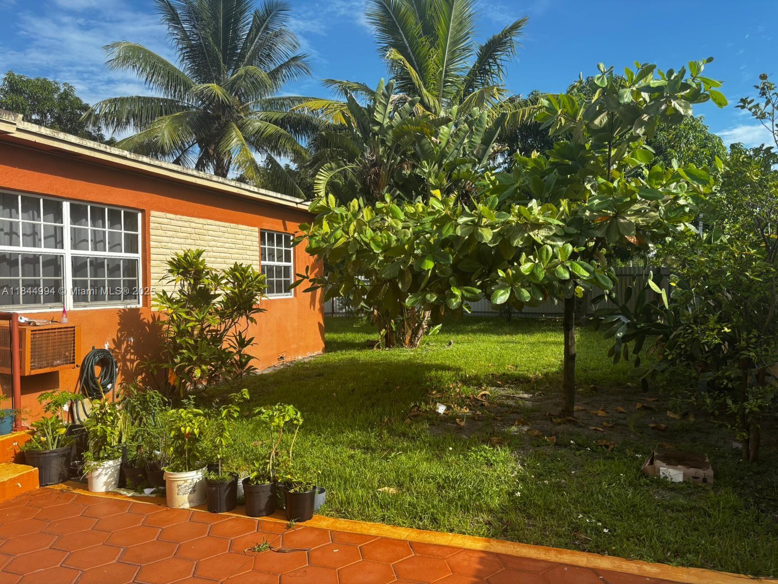 calling all investors and first time buyers! This charming 3 bedroom ,1 bathroom home sits on a desirable corner lot with a huge yard filled with fruits trees . The interior features all tile flooring,central a/c, and a modern island kitchen with granite countertops.The garage has been converted into an additional bedroom (can easily be converted back if desired).For added peace of mind ,the property includes a camera security . dont miss this opportunity