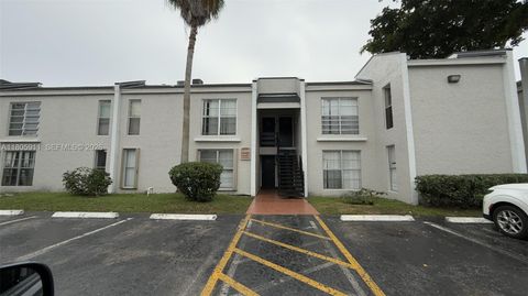 Photo of 4469 Treehouse Ln #B, Tamarac, FL 33319 (MLS # A11805911)