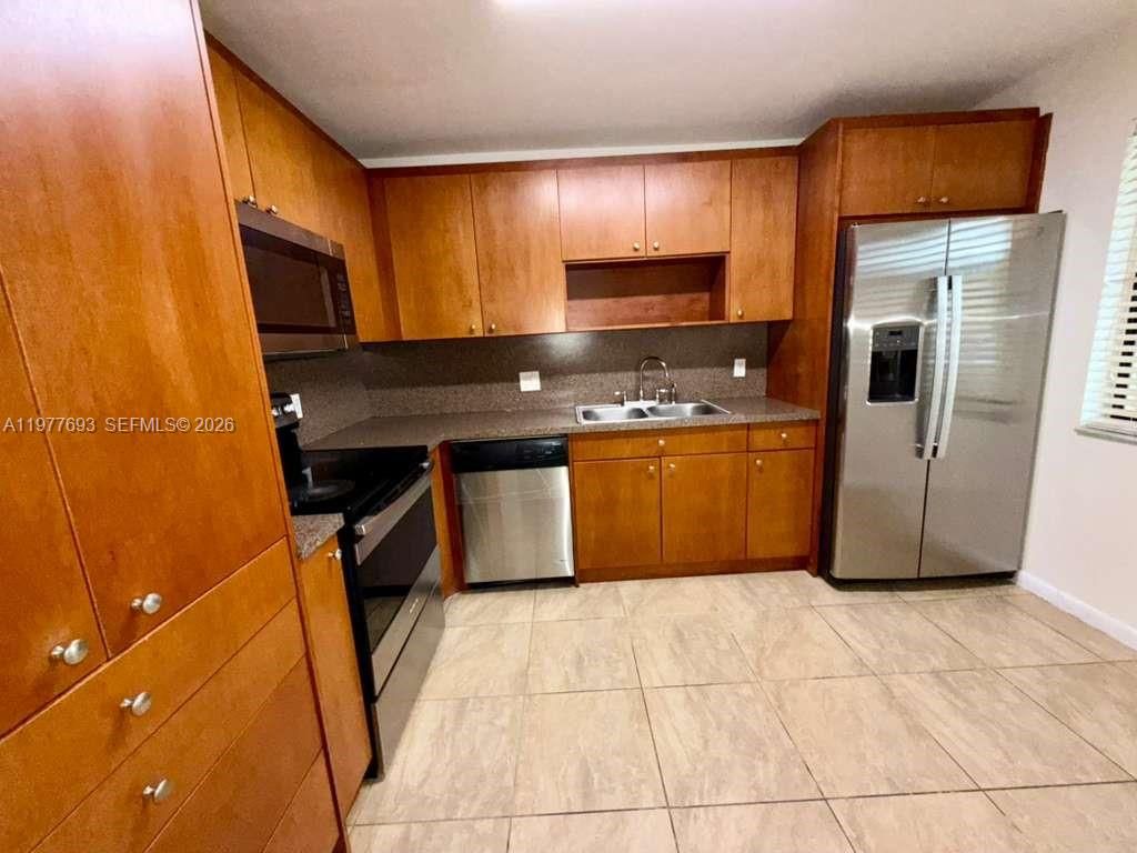 Photo of 16481 Blatt Blvd #102, Weston, FL 33326 (MLS # A11977693)