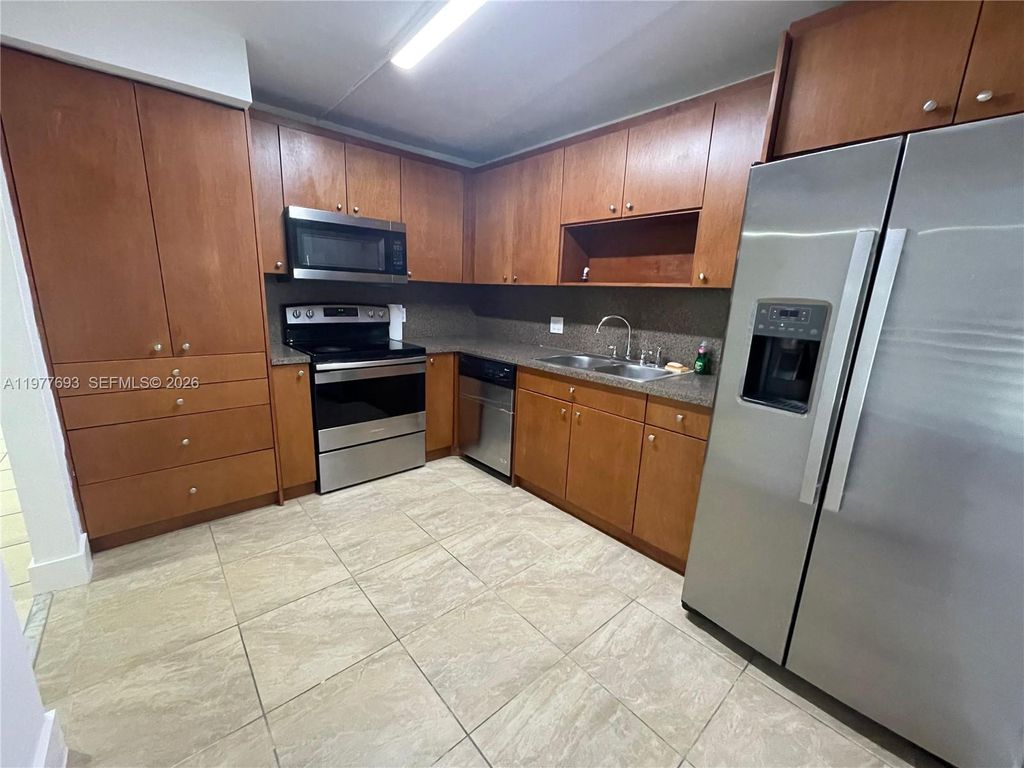 Photo of 16481 Blatt Blvd #102, Weston, FL 33326 (MLS # A11977693)