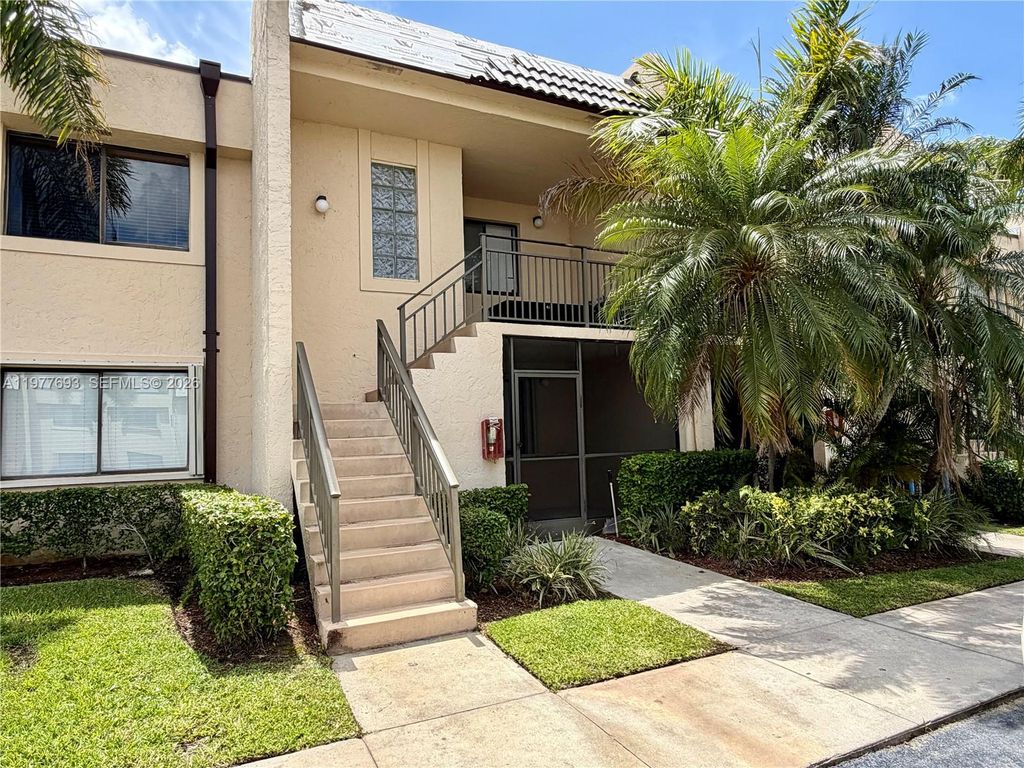 Photo of 16481 Blatt Blvd #102, Weston, FL 33326 (MLS # A11977693)