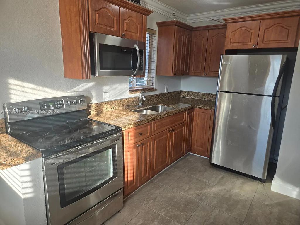 Photo of 2323 Van Buren St #108, Hollywood, FL 33020 (MLS # A11949293)