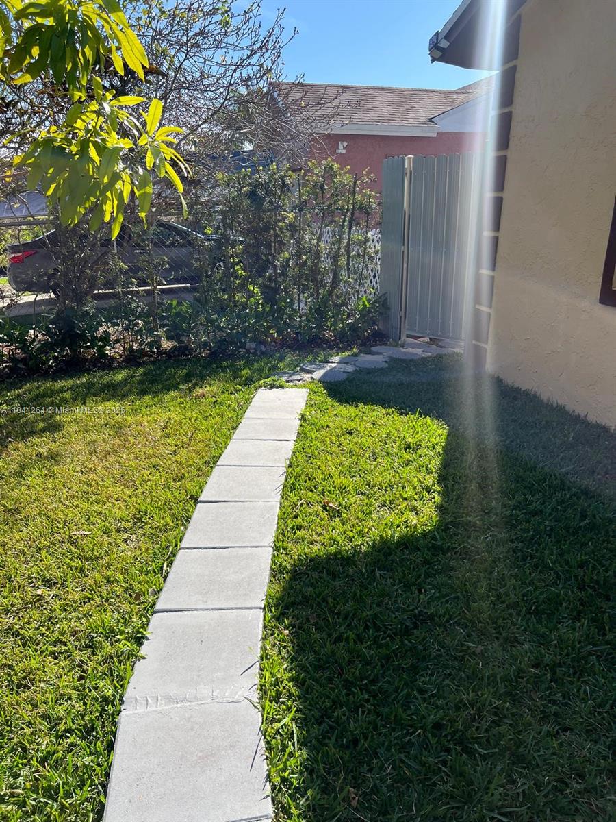This well-kept efficiency for rent offers comfort, privacy, and convenience. It features a private entrance, its own bathroom with a shower and tub, and a mini kitchen equipped with a microwave, mini fridge, and closet space. The spacious interior boasts tile flooring and is ready for immediate move-in. Outside, enjoy a private side yard and a paved driveway. Conveniently located near schools, restaurants, and shopping centers. No HOA! Easy to show—schedule your viewing today!