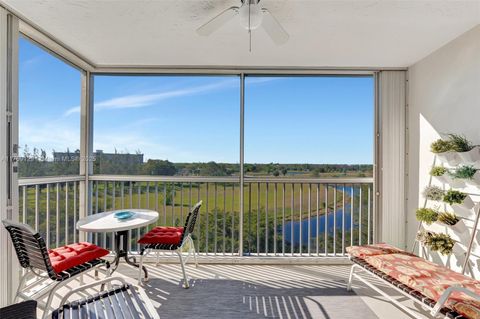 Photo of 3080 N Course Dr #608, Pompano Beach, FL 33069 (MLS # A11759129)