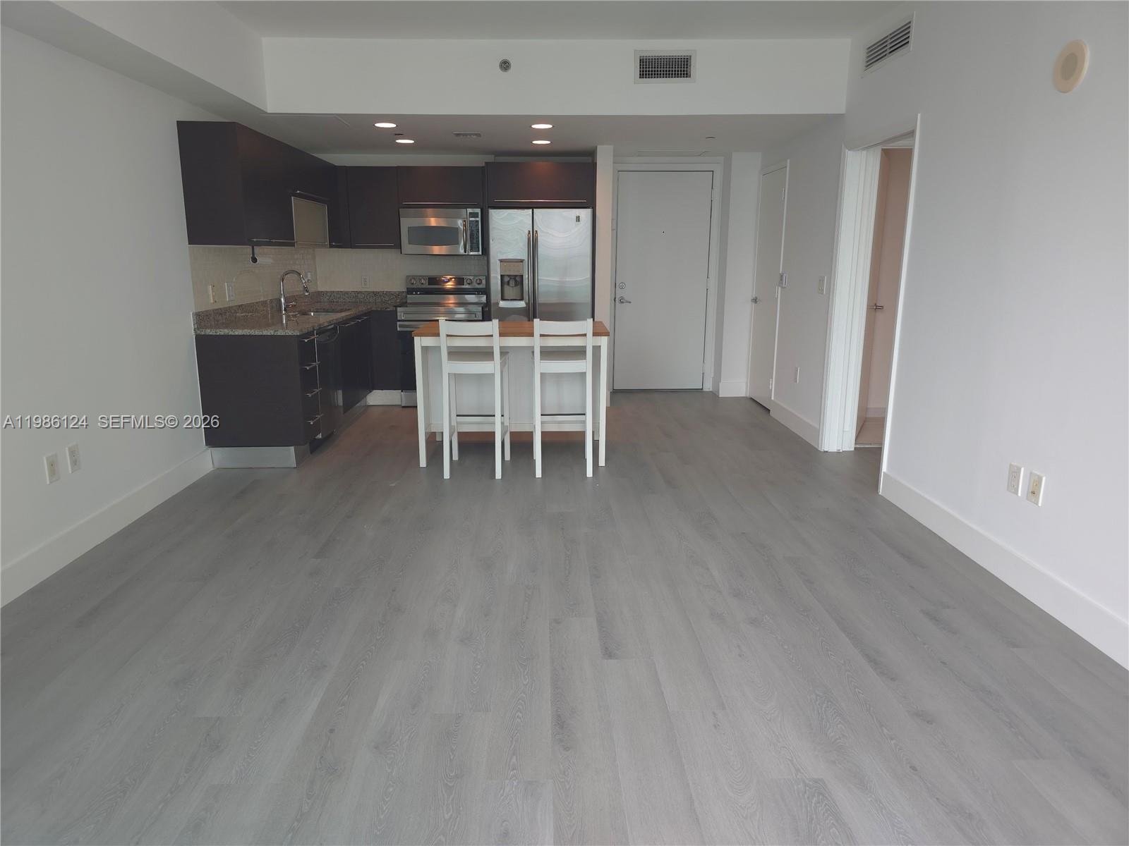 THE PLAZA 851 BRICKELL CO - Residential Lease