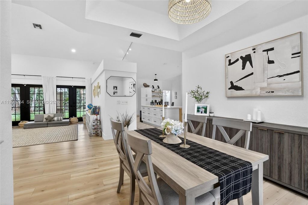 Photo of 10910 NW 18th Ct, Plantation, FL 33322 (MLS # A11993254)