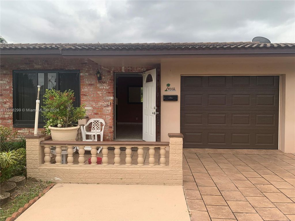 Photo of 4302 NW 44th St #., Tamarac, FL 33319 (MLS # A11618299)