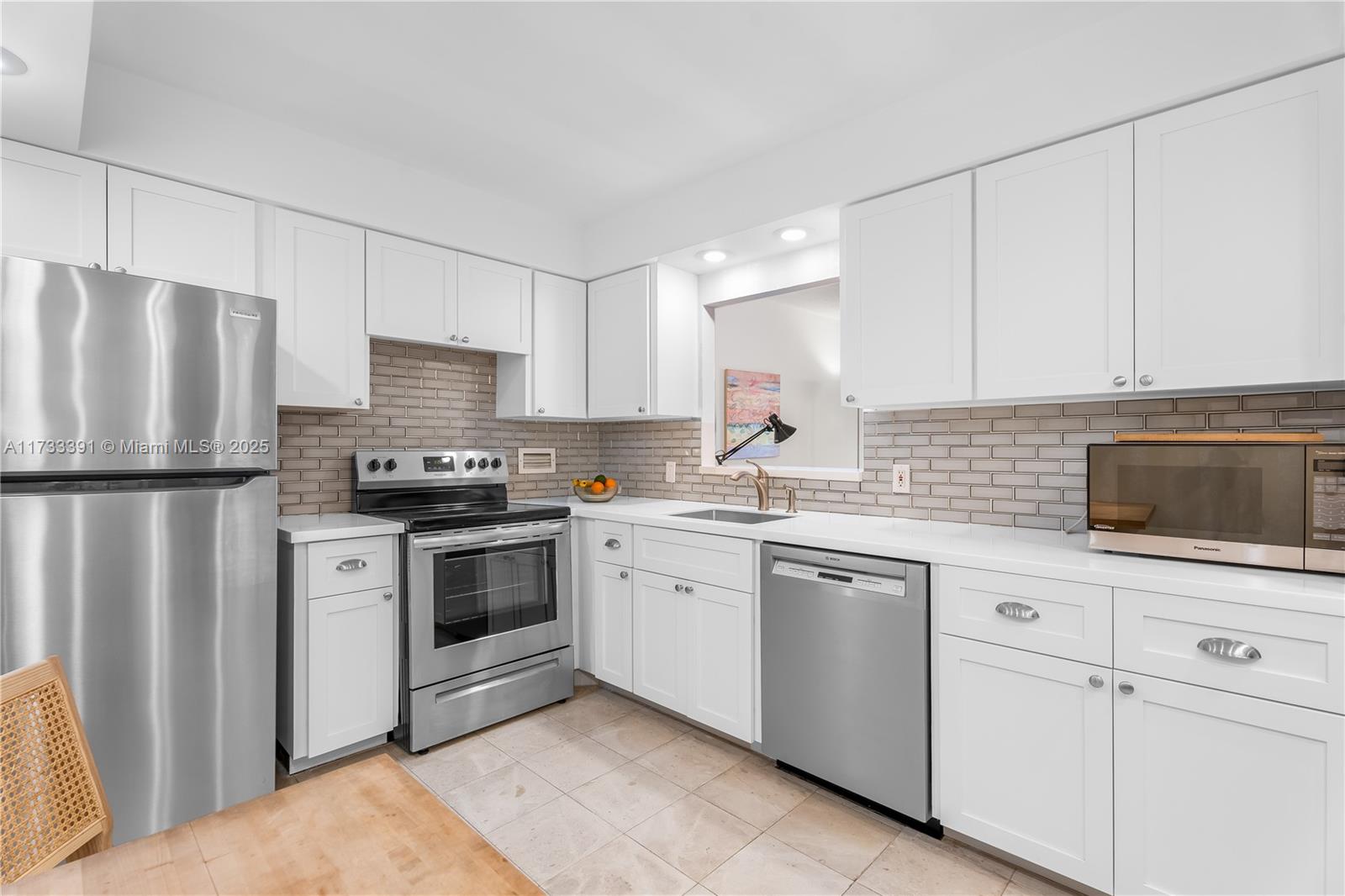 Located in the tranquil Flamingo Park neighborhood, this bright and spacious 1-bedroom, 1.5-bathroom unit offers 890 sq. ft. of living space and features an east-facing balcony with open views. The unit has been thoughtfully updated with impact windows and sliding door, elegant marble flooring throughout, and a sleek, modern kitchen outfitted with stainless steel appliances. Additional conveniences include a walk-in closet, an assigned parking space and a storage unit. Admiral Towers features a pool, bike storage, laundry facilities on every floor, a secure lobby, and an on-site manager. Perfectly situated just steps from Flamingo Park, the beach, Lincoln Road, popular restaurants, boutiques, Whole Foods, and more, this home seamlessly combines comfort, style, and a prime location.