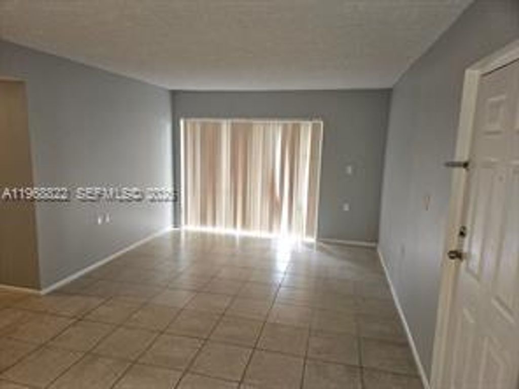 Photo of 1153 Lake Victoria Dr #J, West Palm Beach, FL 33411 (MLS # A11968822)