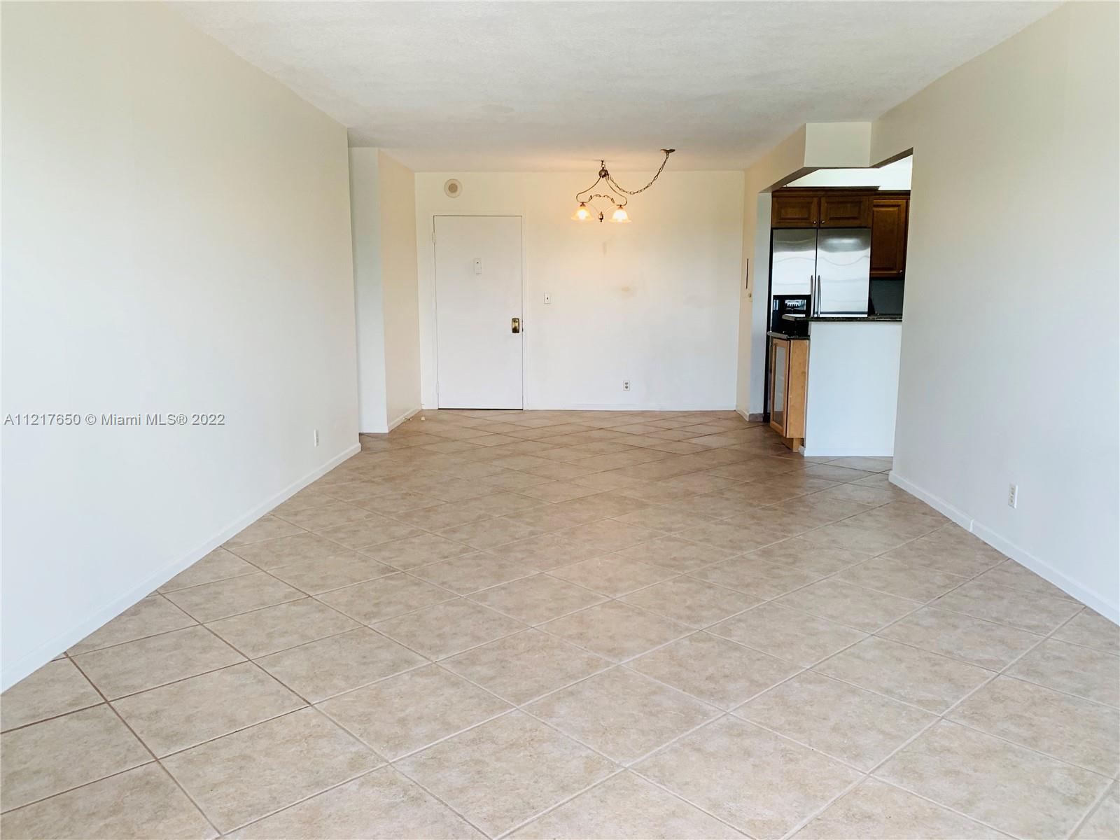 Spacious 2 bedroom apartment with a split floorplan, custom closets, stainless steel appliances, secure building monitored by cameras, excellent school zone, close to shopping, banks, restaurants, coffee shops, beach and all major highways. No washer or dryer in unit, community laundry located on the first floor.