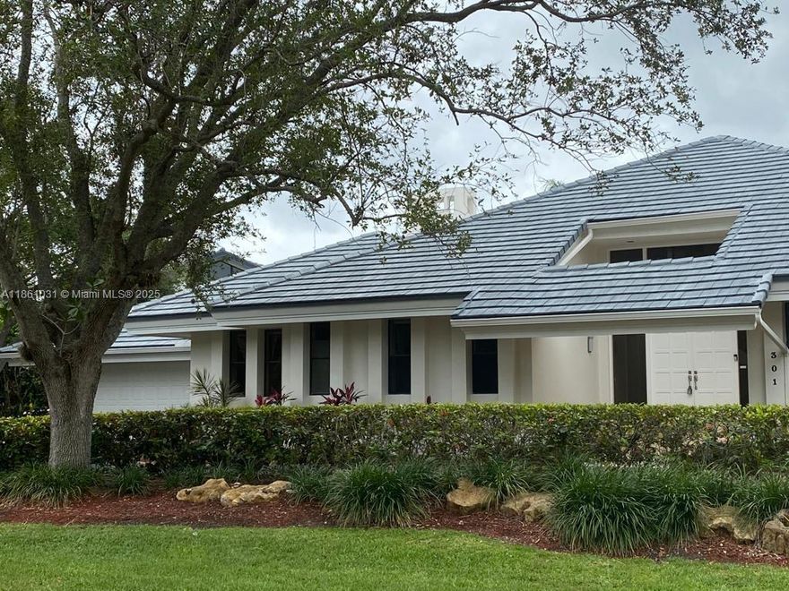 This elegant residence is situated within the prestigious, guard-gated community of Cocoplum, one of South Florida’s most sought-after neighborhoods. The home boasts a formal living and dining room, along with a beautiful modern eat-in kitchen featuring granite countertops, stainless steel appliances, wood cabinetry, and a breakfast nook overlooking the covered terrace and pool area. All social spaces are finished with marble flooring and the bathrooms have been tastefully updated. The layout includes three bedrooms on the first floor, including the spacious master suite, with an additional guest bedroom located upstairs. The property also offers a generous circular driveway and a two-car garage