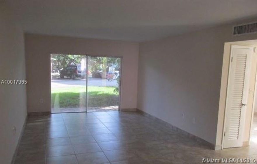 LOCATION, LOCATION, LOCATION!! First Floor unit 2/1 tiled floor throughout, new kitchen cabinets, new appliances, freshly painted and ready to show, excellent location won't last!