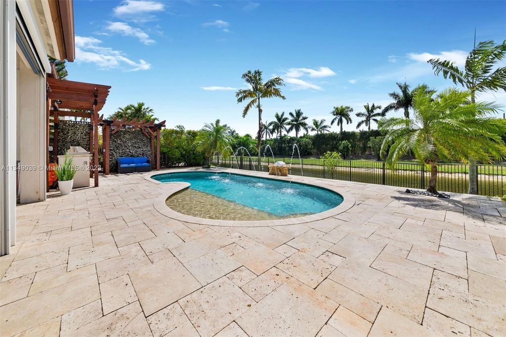 Photo of 8462 NW 27th St, Cooper City, FL 33024 (MLS # A11349039)