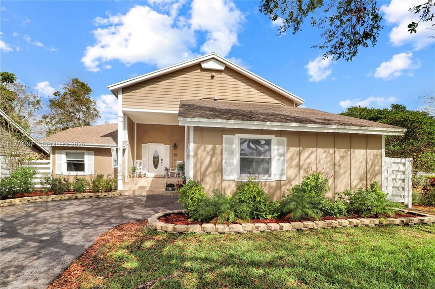 Welcome to your move-in-ready oasis in the heart of the sought-after Country Walk community. This spacious pool home immediately impresses with soaring vaulted ceilings and sleek tile flooring that guide you toward stunning views of a sparkling pool and tropical patio. The main level is designed for effortless entertaining, featuring a wide-open living and dining area that flows seamlessly to the outdoor space, an eat-in kitchen, and a convenient half-bath. Retreat to the expansive first-floor primary suite, complete with a private ensuite bath for ultimate convenience. The second floor offers two additional bedrooms, a full guest bath, and a versatile loft that provides the perfect open living space for a home office or media room. For those needing extra room, the garage has been thoughtfully converted into a functional flex space, while the long driveway easily accommodates up to four vehicles. Beyond the home, enjoy the exceptional lifestyle of Country Walk, which includes a clubhouse, community events, and a 24/7 roving patrol