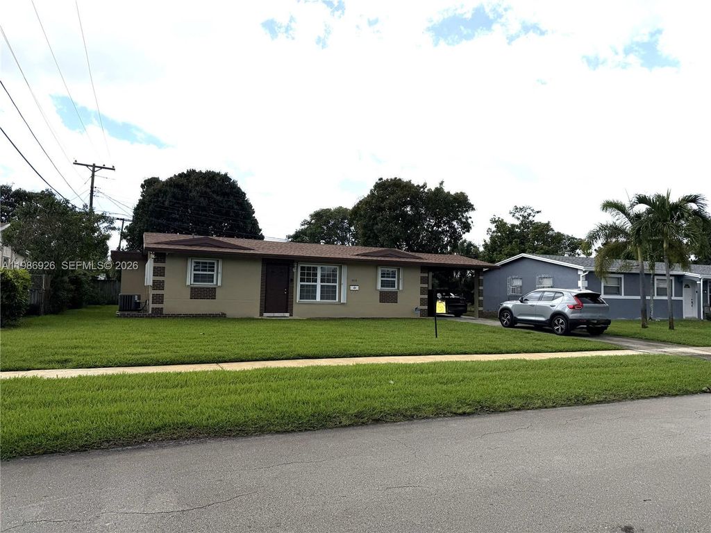 Photo of 4910 NW 15th Ct, Lauderhill, FL 33313 (MLS # A11986926)