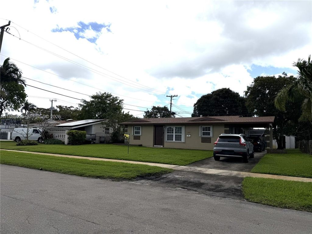 Photo of 4910 NW 15th Ct, Lauderhill, FL 33313 (MLS # A11986926)