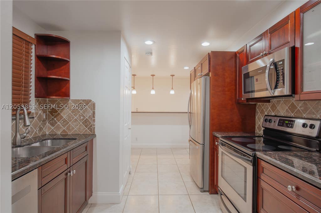 Photo of 2700 Coral Springs Dr #111, Coral Springs, FL 33065 (MLS # A12053851)