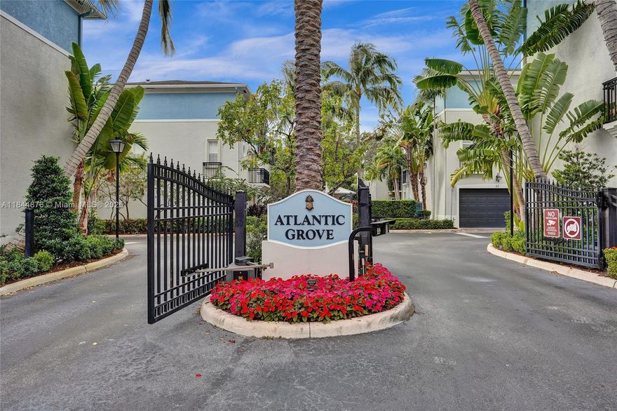 Sea grape model townhome in the  Atlantic Grove a gated community! Built in 2024 and never lived in!3 bedrooms & 3.5 baths, modern design. The third bedroom w/a full bath is on the 1st floor. Wood stairs lead from the 1st to the 2nd floor. The 2nd floor offers an open floor plan w/a great room, dining room, kitchen w/an island & stainless steel appliances. The main living area boast sleek porcelain tile flooring w/ smooth walls & ceilings. Carpeted stairs lead to the 3rd floor, where you'll find the primary suite w/its own bath, along w/the second bedroom & bath. Hurricane-impact windows & doors. Located in the heart of Atlantic Avenue in Delray Beach!