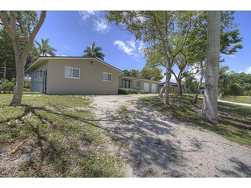 Completely remodeled dream home! Not a Short Sale or Foreclosure. New A/C, High Impact Windows & Doors (Including Garage Doors), Kitchen and Stainless Steel Appliances. Property features Auto Sprinkler from Well, Polished Terrazzo floors, Updated kitchen with granite counter tops and wood cabinetry, completely redone bathrooms, High Hat light fixtures throughout, ADT Wireless Touchscreen Dual Pad Alarm, New Galvanized Gas lines and much more. Lots of room to entertain with 15,000 Sqft Lot size. Pool.