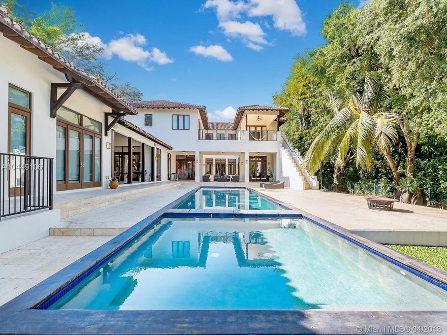 Step into this PINECREST GEM boasting stunning 40,075 SF LOT. Built for family ready to ENTERTAIN OUTDOORS, this 7,922 SF, 7 bedroom/7.5 bathroom home features full covered terrace BBQ & outdoor dining area alongside oversized heated salt water infinity pool & spa. Front doors open to foyer w/ 15 ft ceilings & direct views of the 400 ft deep yard. First floor offers marble floors throughout, w/ top of the line kitchen & Monogram appliances + Scavolini cabinets, as well as gas stove & wine cellar. Brazilian wood floors throughout the second floor, featuring the master bedroom plus 3 additional bedrooms & family room. Complete w/ smart home capabilities, top of line GENERATOR & purified water system. Located in prime location near Miami’s Pinecrest school district, restaurants & shops.