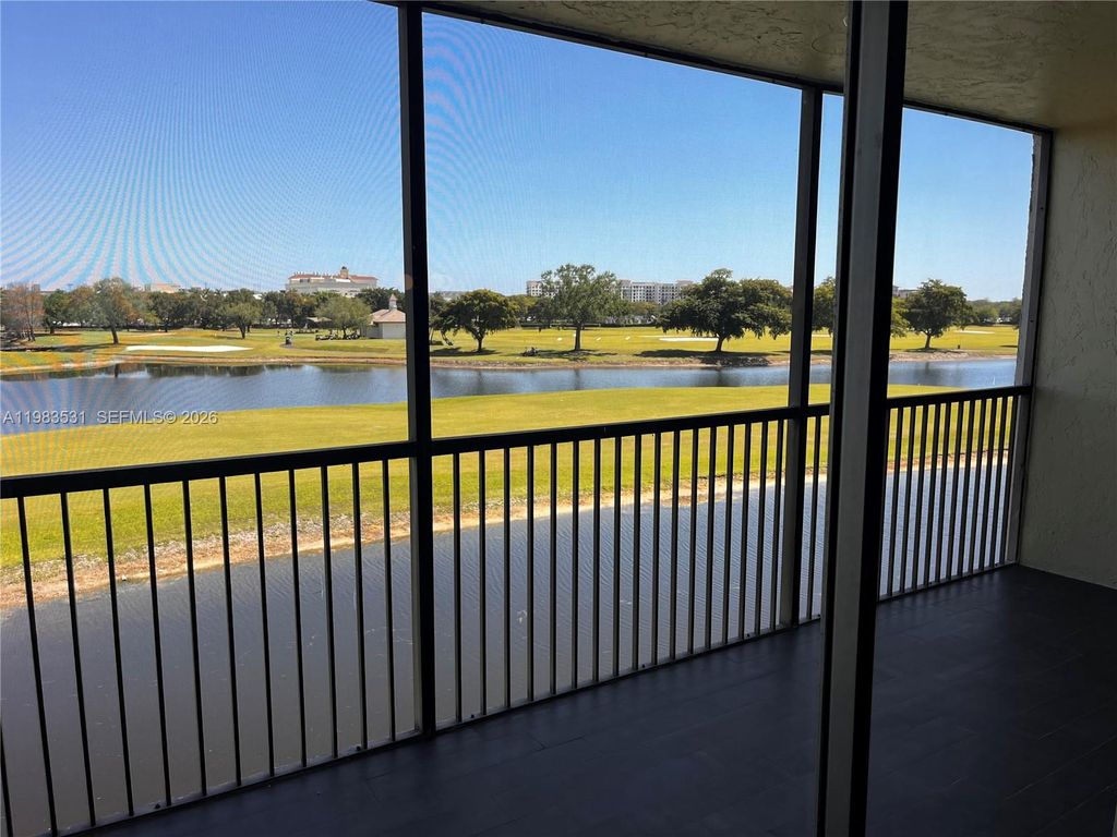 Photo of 3100 W Rolling Hills Cir #403, Davie, FL 33328 (MLS # A11983531)