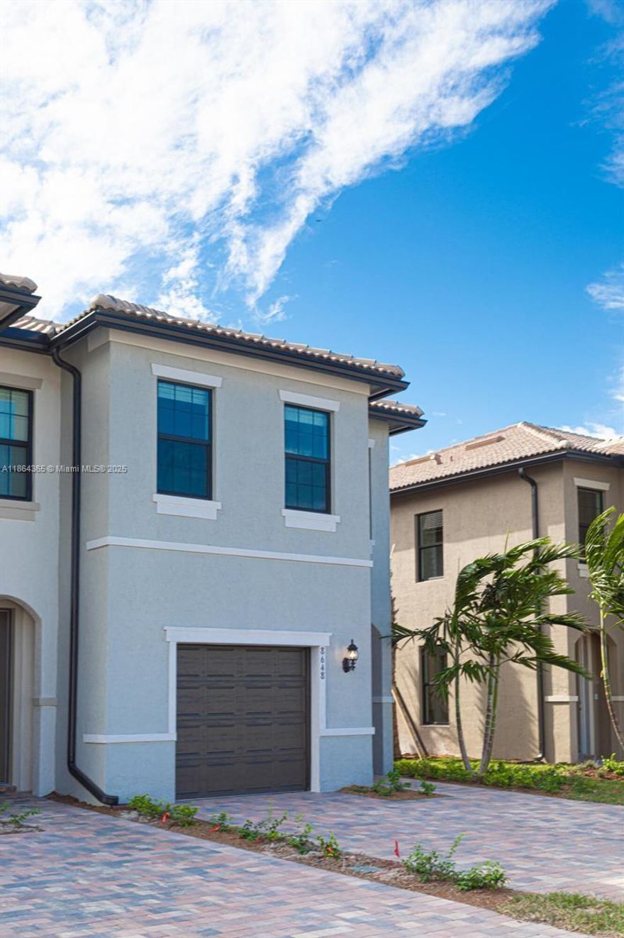 Introducing your dream townhouse, located in The Fields gated community! Built in 2022, this end-unit home features 3 spacious bedrooms, 2.5 bathrooms, and an open, airy layout. Inside, you’ll find ceramic tile and carpet flooring, high ceilings, and an abundance of natural light. Enjoy ultimate privacy and security in this gated community, offering exclusive key fob access to two clubhouses, a pool, gym, playgrounds, and more.
Perfectly situated near Wellington’s equestrian attractions and top-rated schools, including Dr. Joaquin Garcia High School. With shopping, dining, and entertainment just minutes away, everything you need is right at your doorstep. Don’t miss the opportunity to live in a luxurious, resort-style community with endless amenities.
