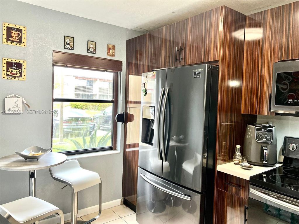 Photo of 11304 Taft St #11304, Pembroke Pines, FL 33026 (MLS # A11983663)