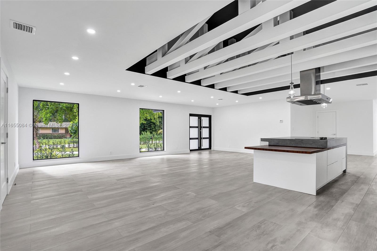Beautiful modern home with lots of character in the perfect serene location at Plantation Acres South. Nestled on a cul-de-sac Street close to a park and walking bike pathways. A retreat of your own oversized pool and a peaceful backyard with the view of a pond. The split design provides privacy to the large master suite with balcony and walk in closet and the view of the serene pond. Its modern open kitchen design enhances beautifully this amazing home making it the focal and astonish point as soon as you open the doors. its ample family room has the view of the oversized deep blue pool. All impact windows and doors and new appliances , brand new metal roof and AC., large laundry room and 3.5 bath. Ample circular driveway with modern design. This is a must see that will not last!
