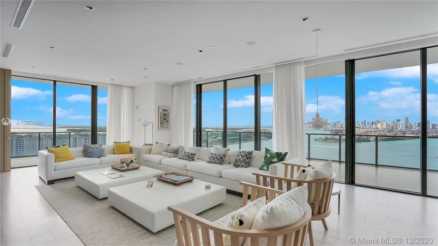 Ideally situated in South of Fifth, this expansive unit in Apogee South Beach features 4BR/4.5BA and den under 4,154 SF of luxurious living space surrounded by amazing views of the Miami skyline and So FL sunsets. Private elevator foyer opens to a flow-through floor plan with 11’ ceilings, walls of windows and gorgeous flooring. The brand new, state-of-the-art kitchen from Ornare has been impeccably designed with clean lines and superb craftsmanship and includes a Sub-Zero refrigerator, wine storage, double ovens, large kitchen island/ bar. Spa-like baths have the finest finishes while the split bedroom plan ensures privacy and offers large rooms and walk-in closets. Smart home technology, 2,500SF wraparound terrace and prvt, a/c garage add to the impressive array of features.