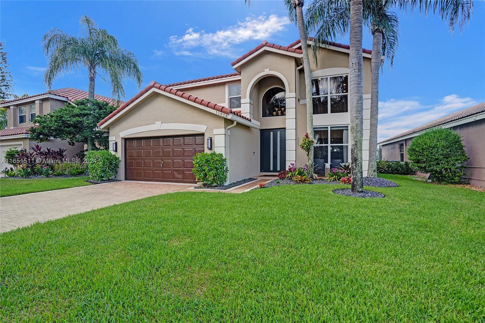 Style and comfort await you in this recently updated, Waterfront home!. Gated enclave of homes in "The Island" at Wyndham Lakes of Coral Springs! This 4/3 home on water gives you magnificent views and sunsets from the Triple-waterway views! Light and bright with attention to detail by a professional decorator that leaves nothing to be desired! Three person spa to enjoy the views and privacy screening for your comfort! Broker Remarks has ages, Most of this home was updated between 2018 and 2024. Feature sheet has detailed lists of home & community amenities.