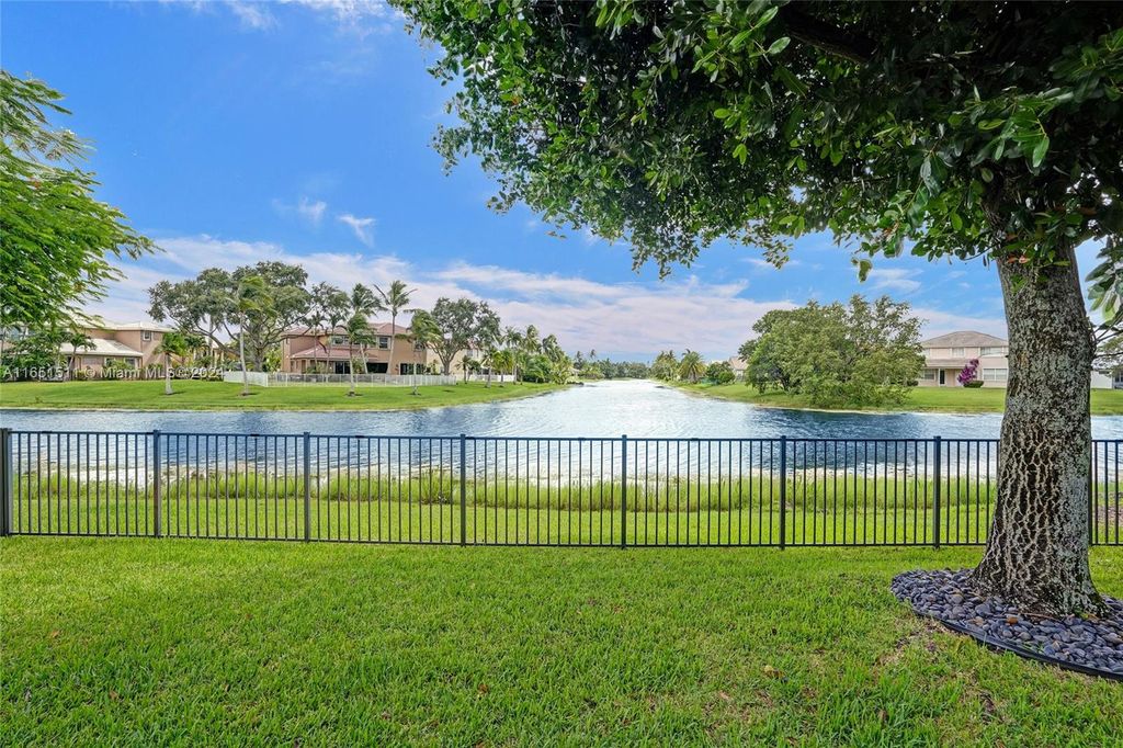 Photo of 11828 NW 53rd Ct, Coral Springs, FL 33076 (MLS # A11651511)