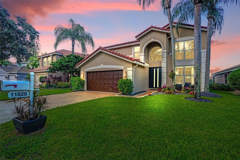 Photo of 11828 NW 53rd Ct, Coral Springs, FL 33076 (MLS # A11651511)