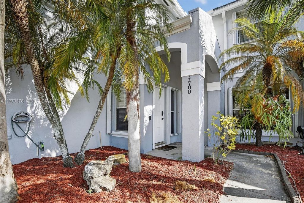 Photo of 4700 Grapevine Way, Davie, FL 33331 (MLS # A11970378)