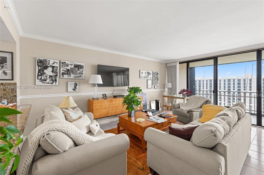 This exquisite 2-bedroom, 2-bathroom unit offers breathtaking views of Biscayne Bay. The open-concept layout creates a spacious living area perfect for entertaining guests or relaxing with family. The kitchen features custom cabinetry, granite countertops, and stainless steel appliances, designed to inspire culinary creativity. The master suite features a spa-like ensuite bathroom with a soaking tub and dual vanities. The 2nd bedroom offers versatility, ideal for guests or as a home office, ensuring comfort and privacy. The expansive balcony invites you to unwind while overlooking the bay. Residents of The Jockey Club enjoy exclusive access to amenities, including a sparkling pool, tennis courts, a fitness center, and 24-hour security, providing both luxury and peace of mind.