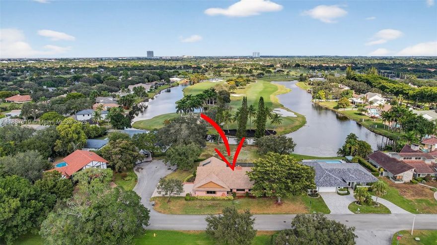 Experience luxury living in prestigious Lago Mar Colony! This gated golf course community features 98 custom homes and 27 condos with 24/7 manned security.  This spacious 3 bed/3.5 bath pool home located on a quiet cul-de-sac offers a split floor plan, impact windows/doors, large laundry / mud room, and a wood-burning fireplace.  The oversized garage with 11' ceilings & tall garage door is ideal for large vehicles, recreational toys or boat storage. The large attic space offers potential for a loft, playroom or extra storage. Enjoy a private patio with serene pool and golf course views over a vacant lot. Optional memberships to Lago Mar Country Club include golf, tennis, pickleball, dining, and events. Prime location near all major highways, FLL Airport, Sawgrass Mills & American Heritage.