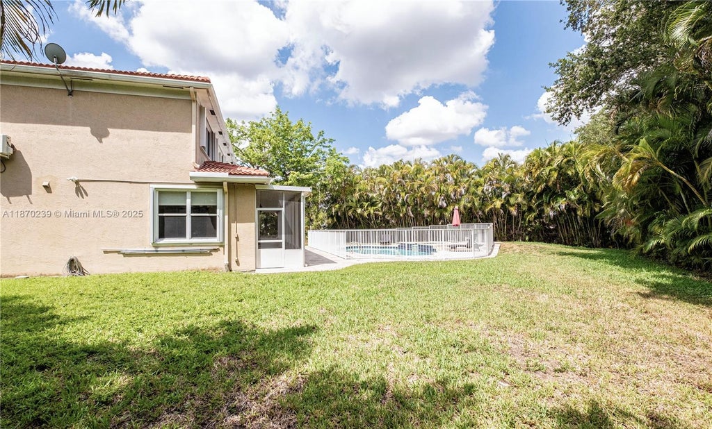 Photo of 5280 NW 95th Ave, Coral Springs, FL 33076 (MLS # A11870239)